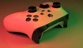 Close up of Xbox Series X white controller in red and green light