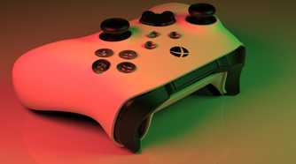 Close up of Xbox Series X white controller in red and green light