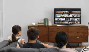 Eero mesh router next to a TV