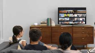 Eero mesh router next to a TV