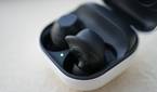 Galaxy Buds FE with one bud sticking out of the case