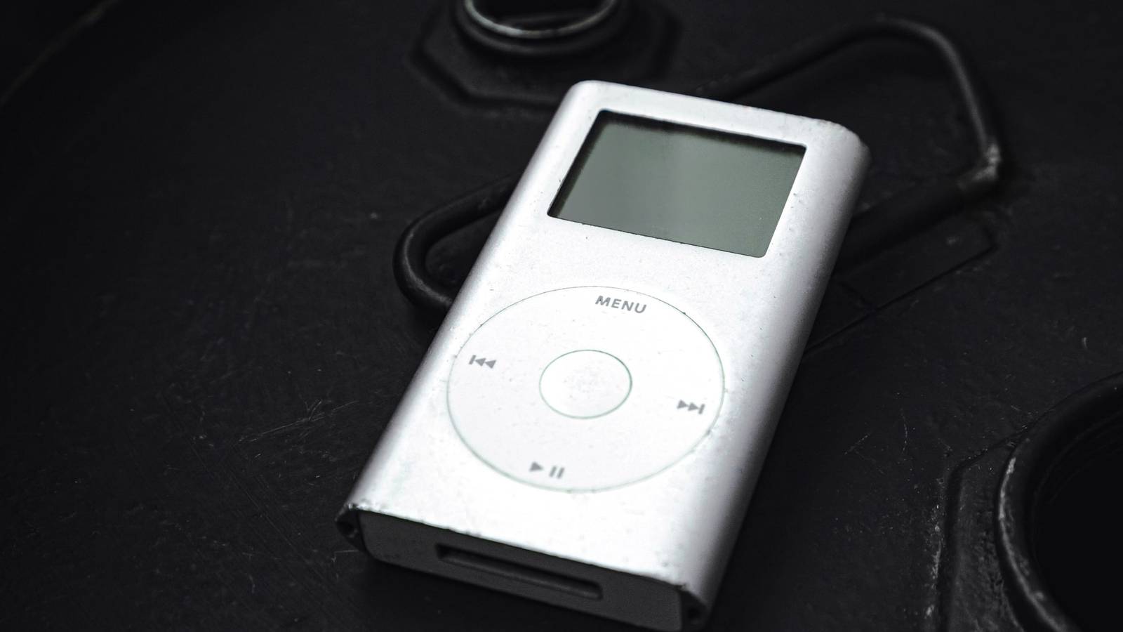 An image of the iPod on a black table