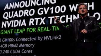 Nvidia CEO Jensen Huang on stage with Quadro GV100 details behind him