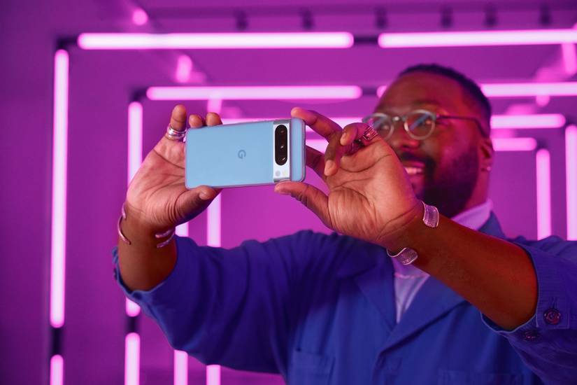 Pixel 8 Pro being used as a camera by a model