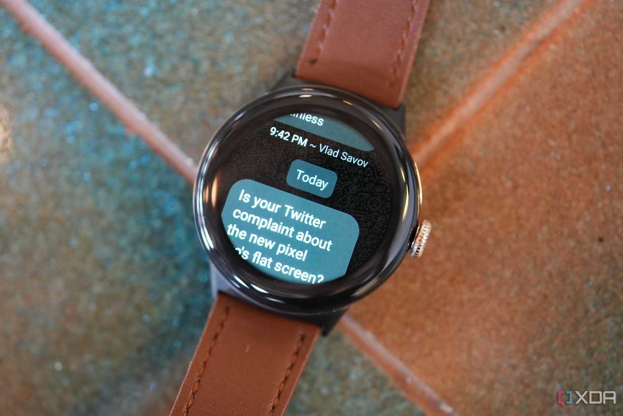 The Pixel Watch 2 showing a WhatsApp message.