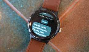 The Pixel Watch 2 showing a WhatsApp message.