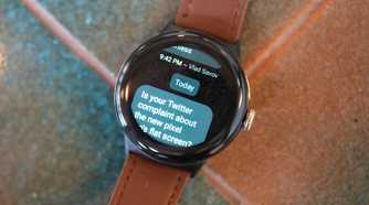 The Pixel Watch 2 showing a WhatsApp message.
