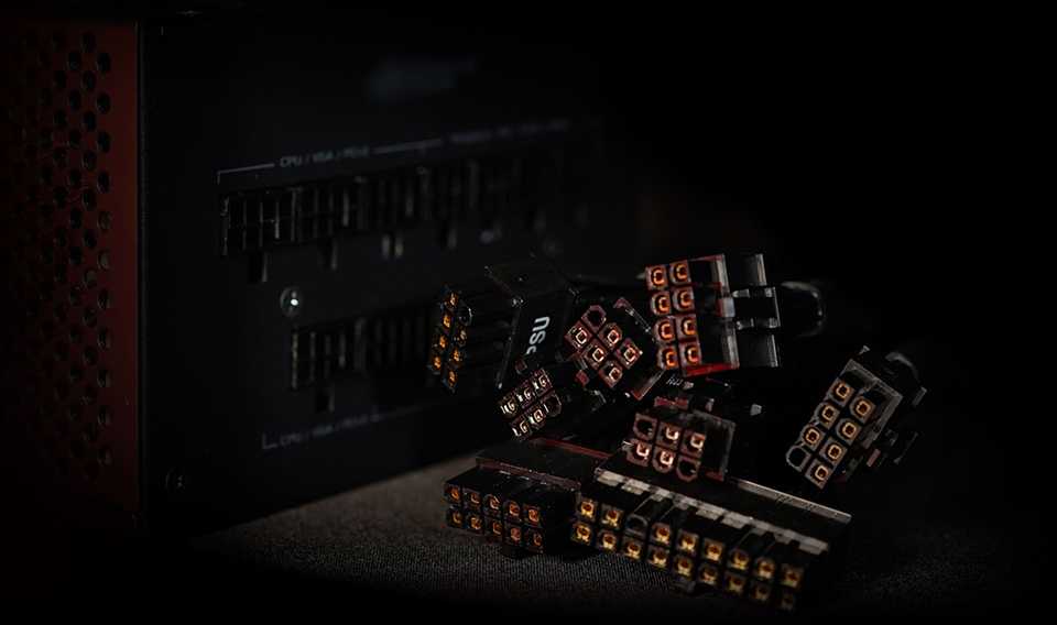 A black modular power supply with its cable connectors