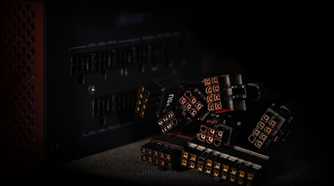 A black modular power supply with its cable connectors