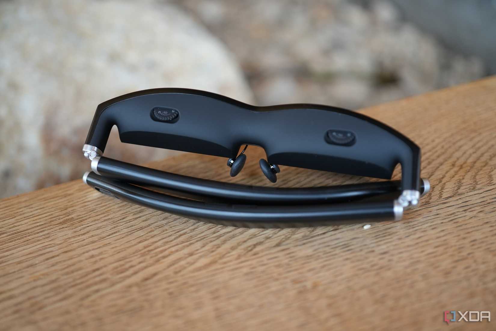 viture one glasses, back view on a table