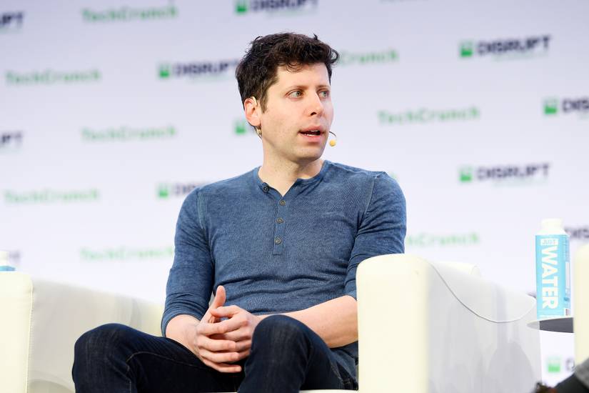 Sam Altman sitting at a TechCrunch event