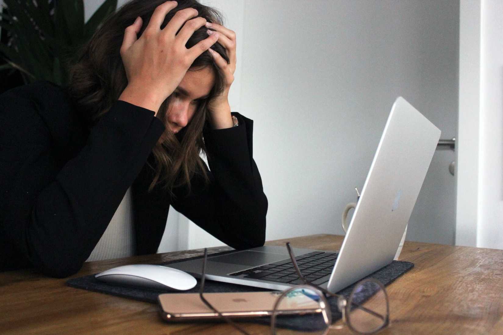 person frustrated with computer