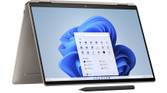 Front view of the HP Spectre x360 14 in Sahara Silver in tent mode