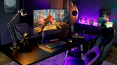 LG UltraGear 45” OLED Curved Gaming Monitor on desk in gaming room with RGB lighting