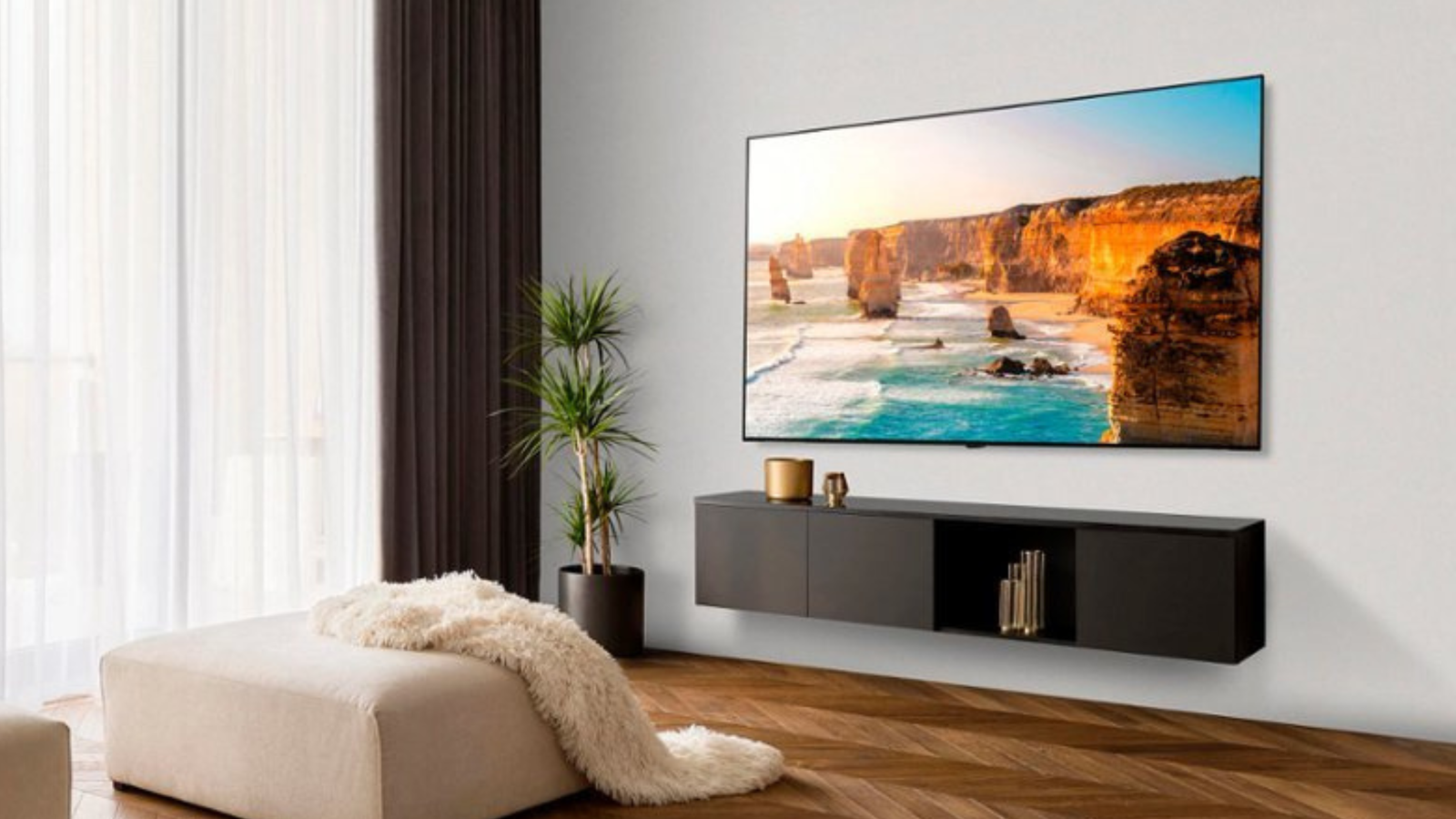 LG Class B3 Series OLED 4K UHD Smart webOS TV on wall of living room