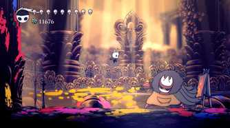 A tiny character jumping around a large creature from the game Hollow Knight.