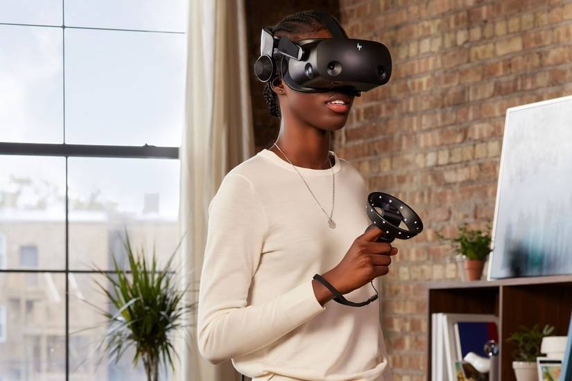 Woman wearing an HP Reverb G2 mixed reality headset