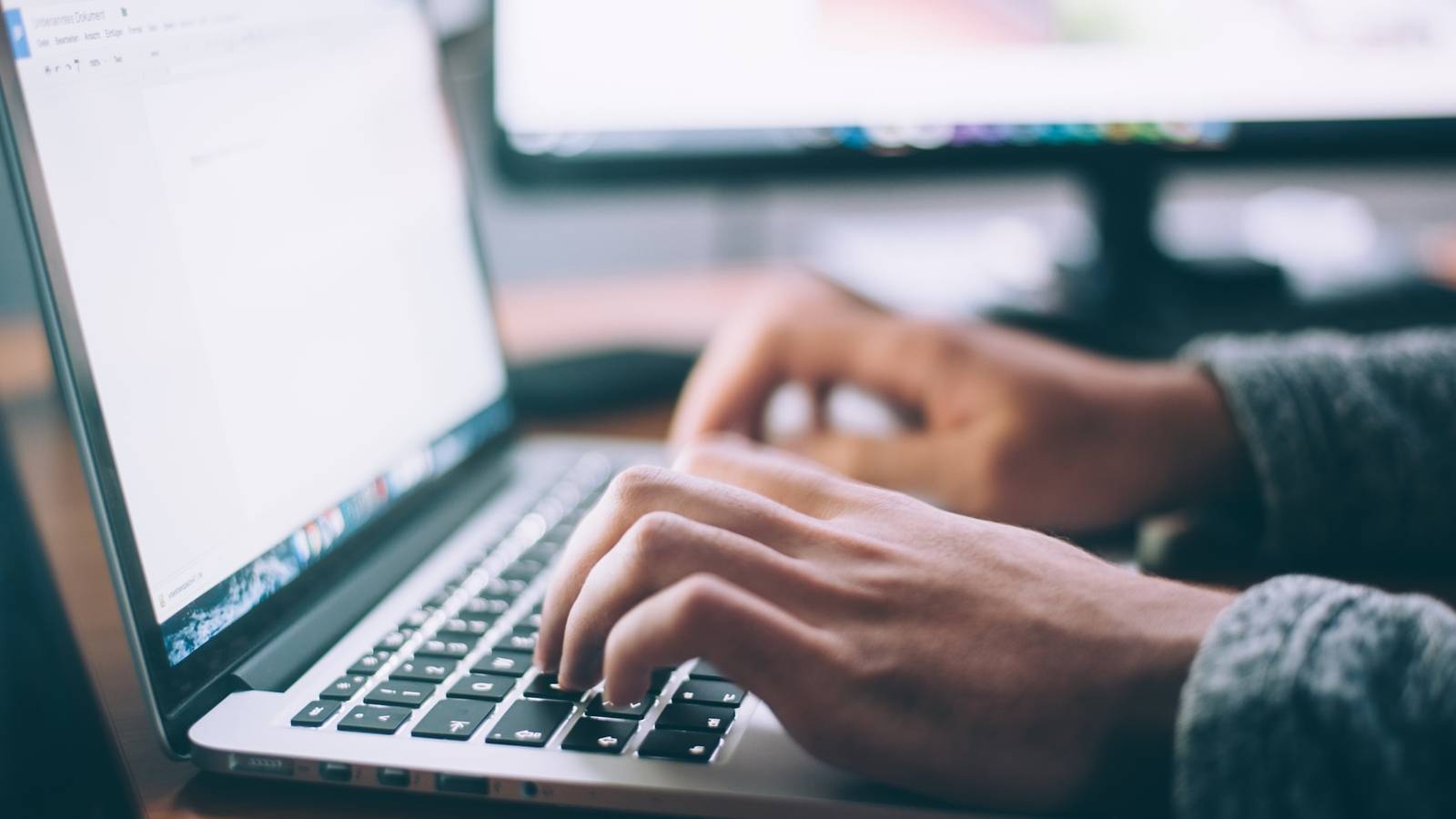 A photo of someone writing an email