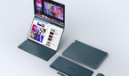 A photo of the Yoga Book 9i with all the accessories and the screen open in the vertical mode