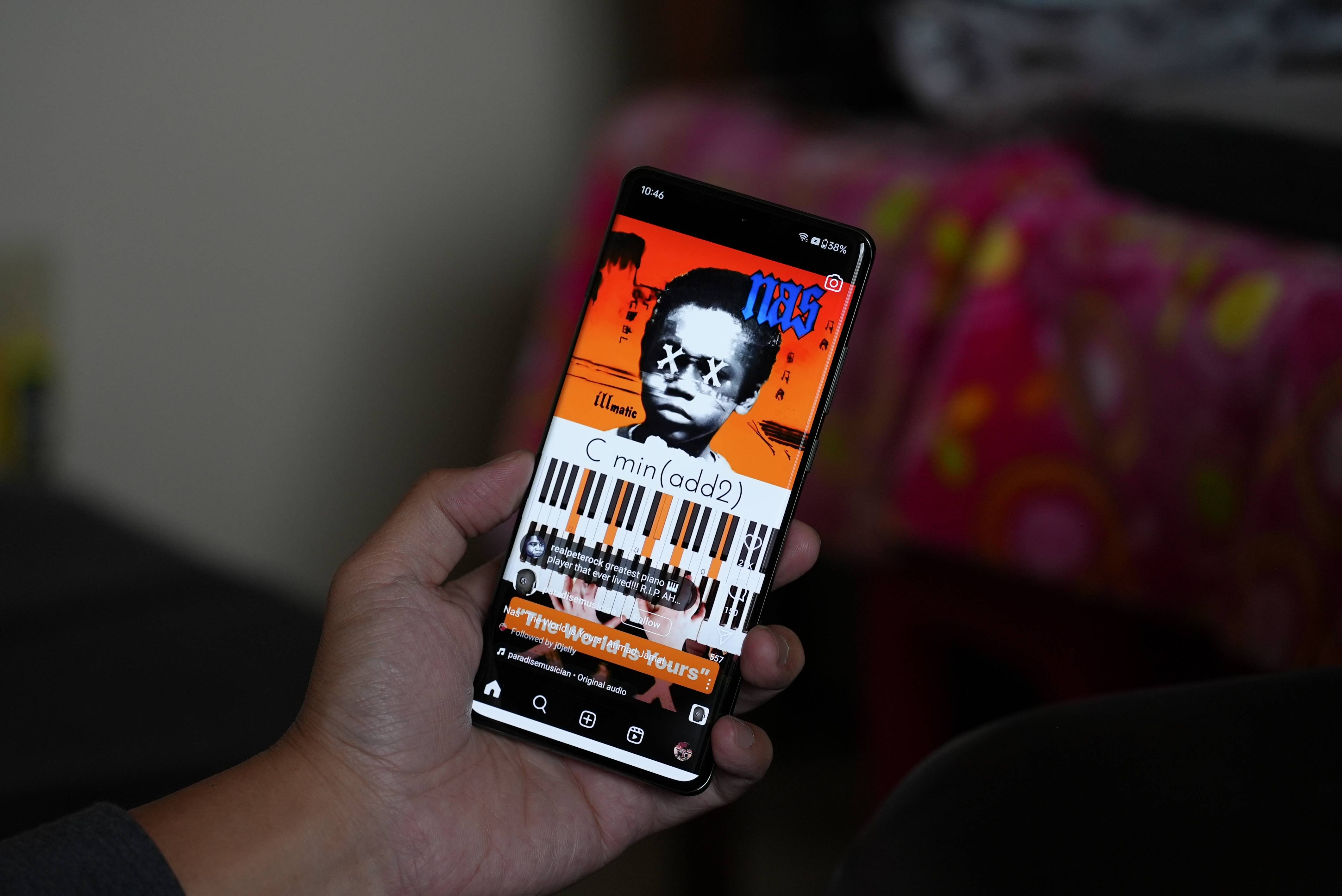 oneplus 12 in the hand showing Nas