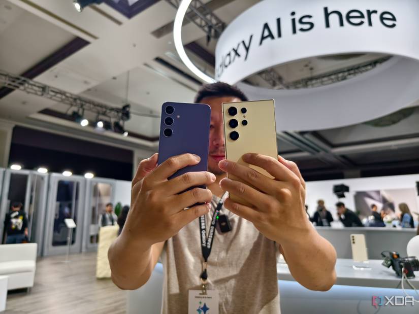 Galaxy S24 Ultra and standard S24 in the hand