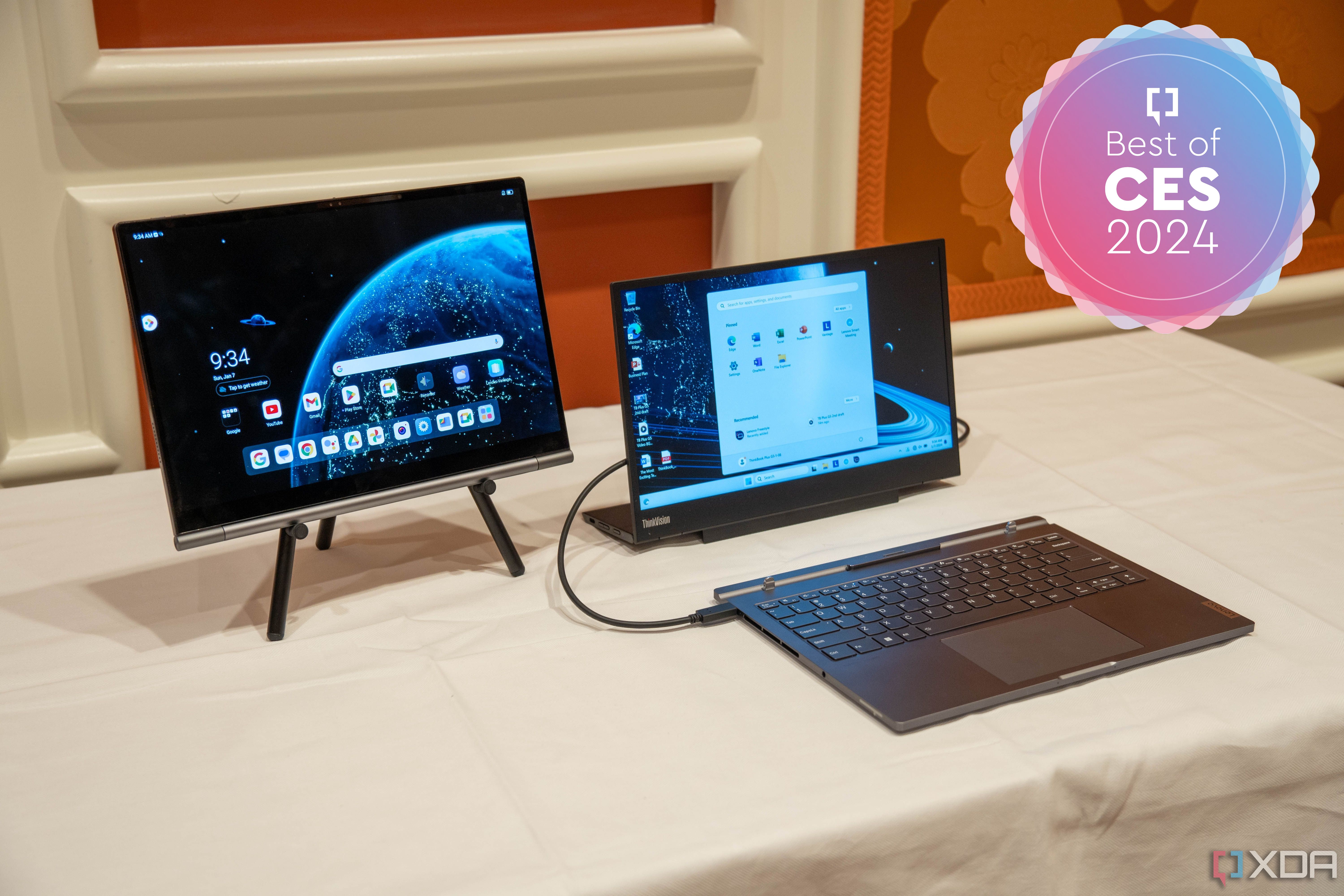 A Lenovo ThinkBook Plus Gen 5 Hybrid Station connected to an external display next to a Hybrid Tab held up on a stand