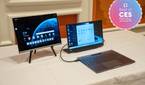 A Lenovo ThinkBook Plus Gen 5 Hybrid Station connected to an external display next to a Hybrid Tab held up on a stand