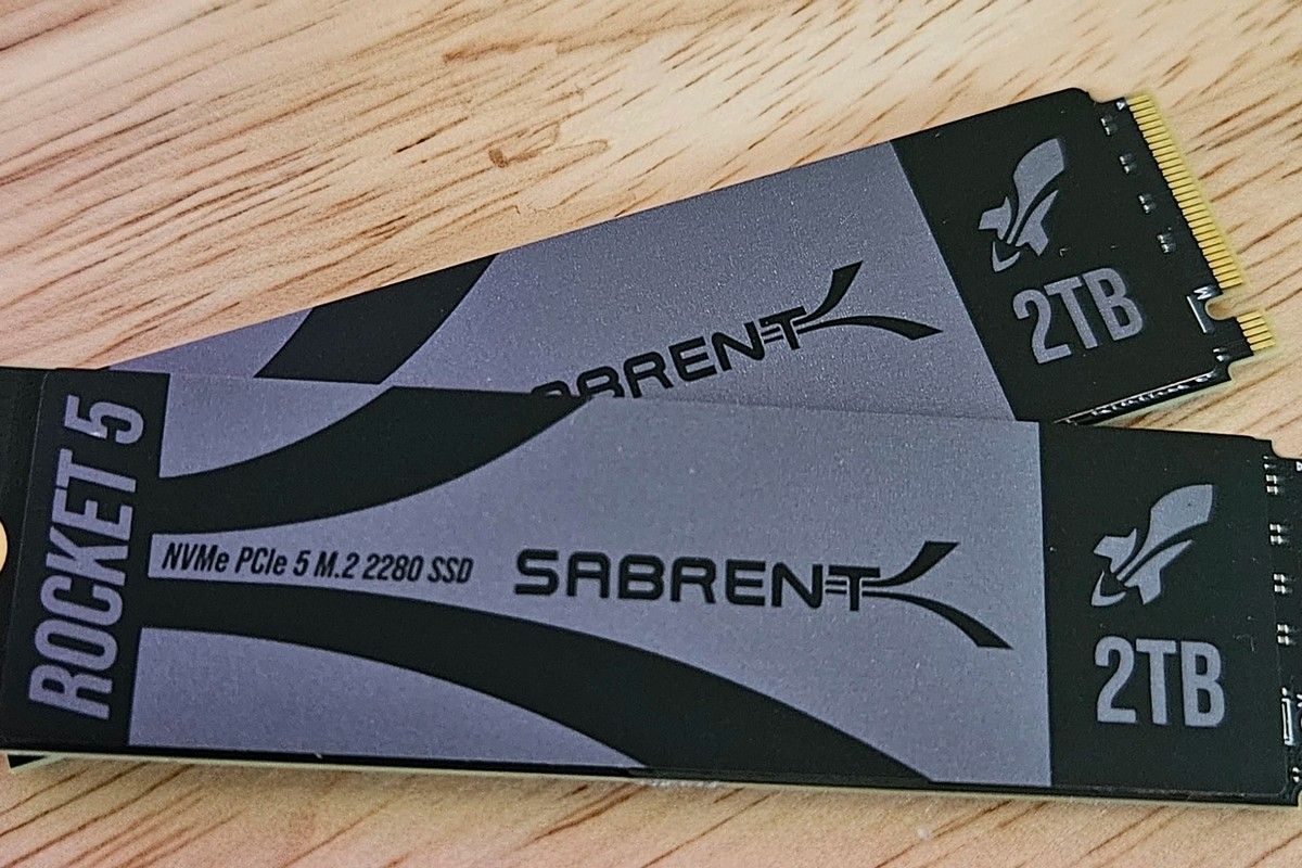 Two Sabrent Rocket 5 M.2 2280 NVMe SSD modules on a table