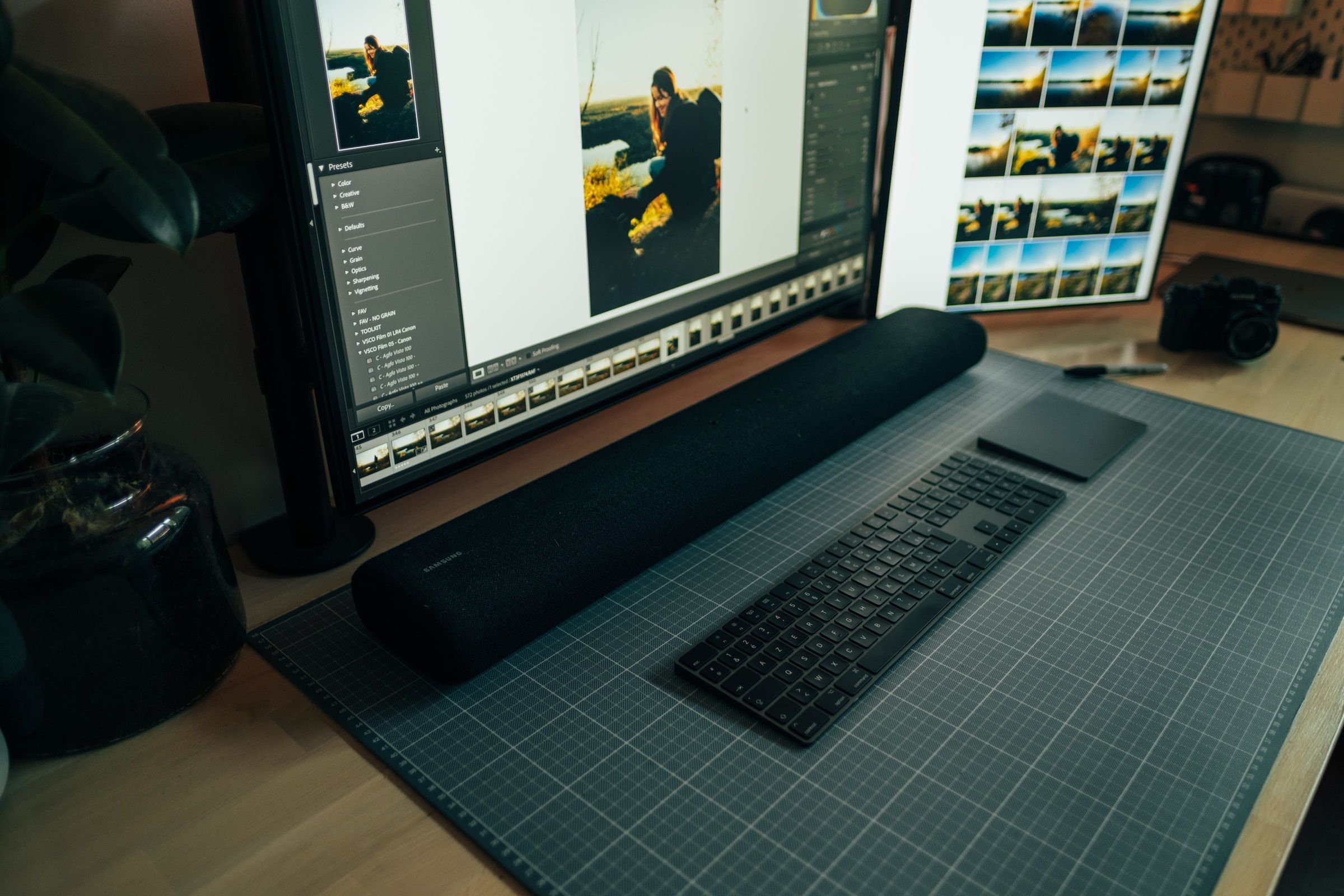 Samsung soundbar on a PC desk.
