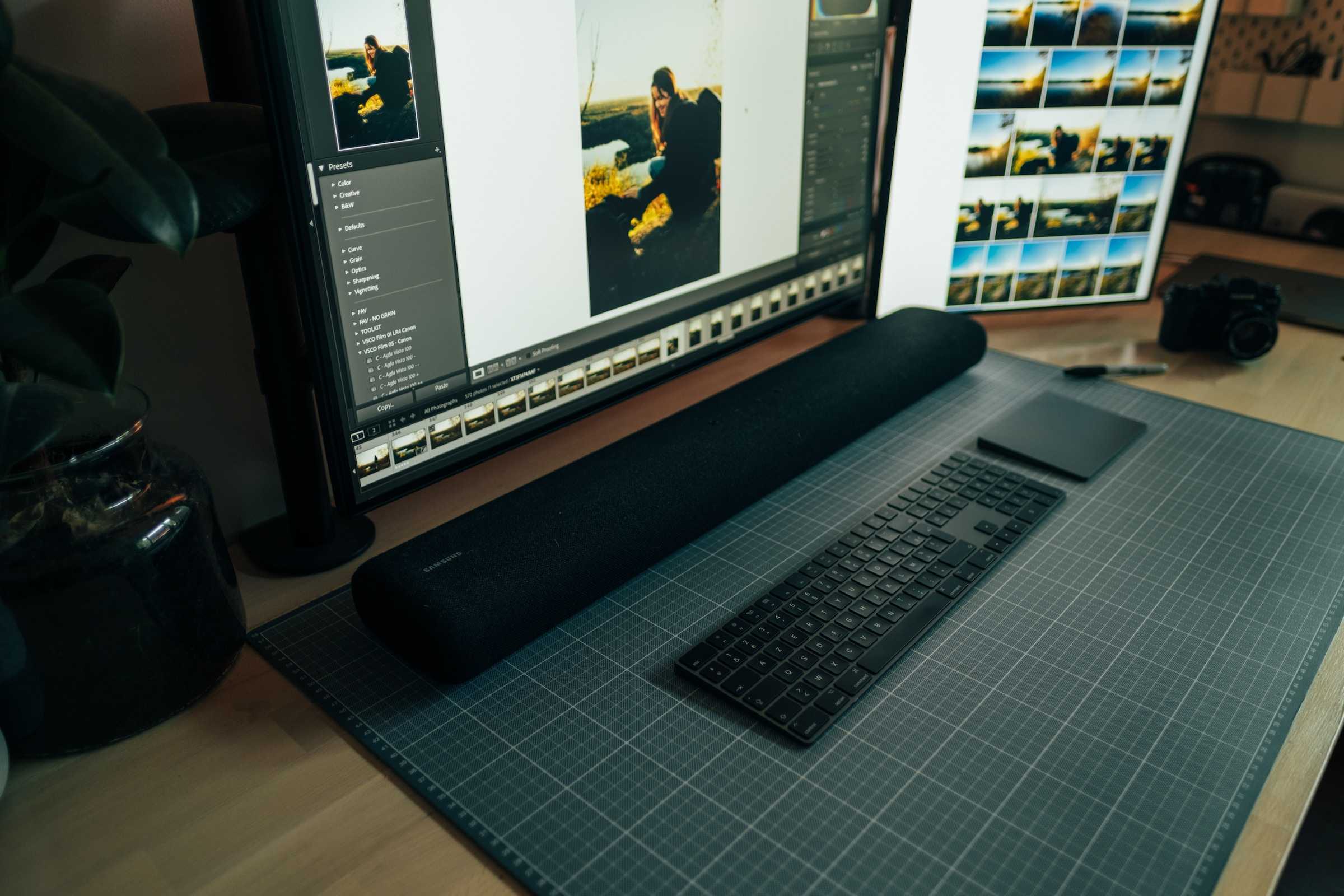 Samsung soundbar on a PC desk.