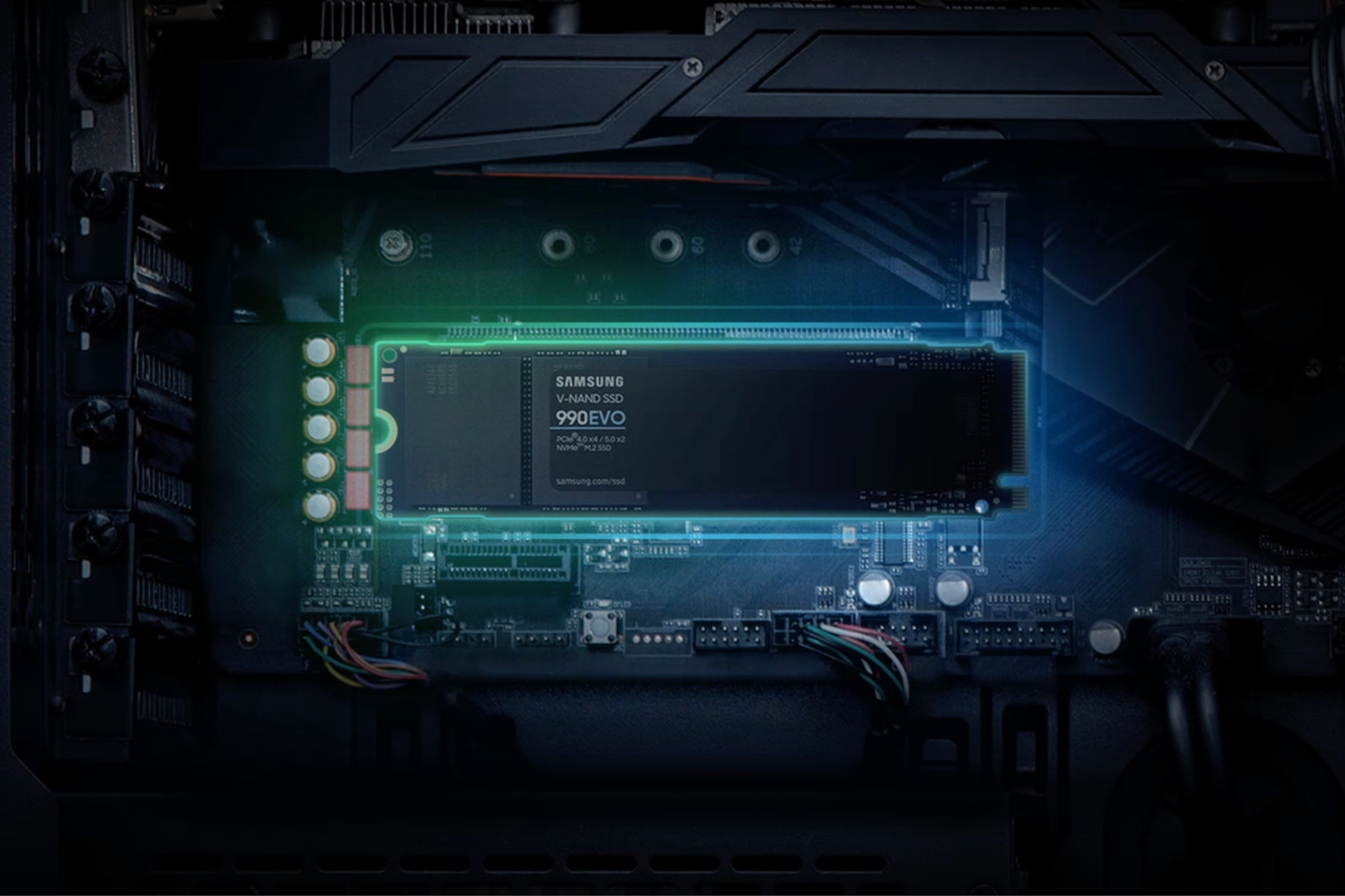 SAMSUNG 990 EVO SSD glowing on a motherboard