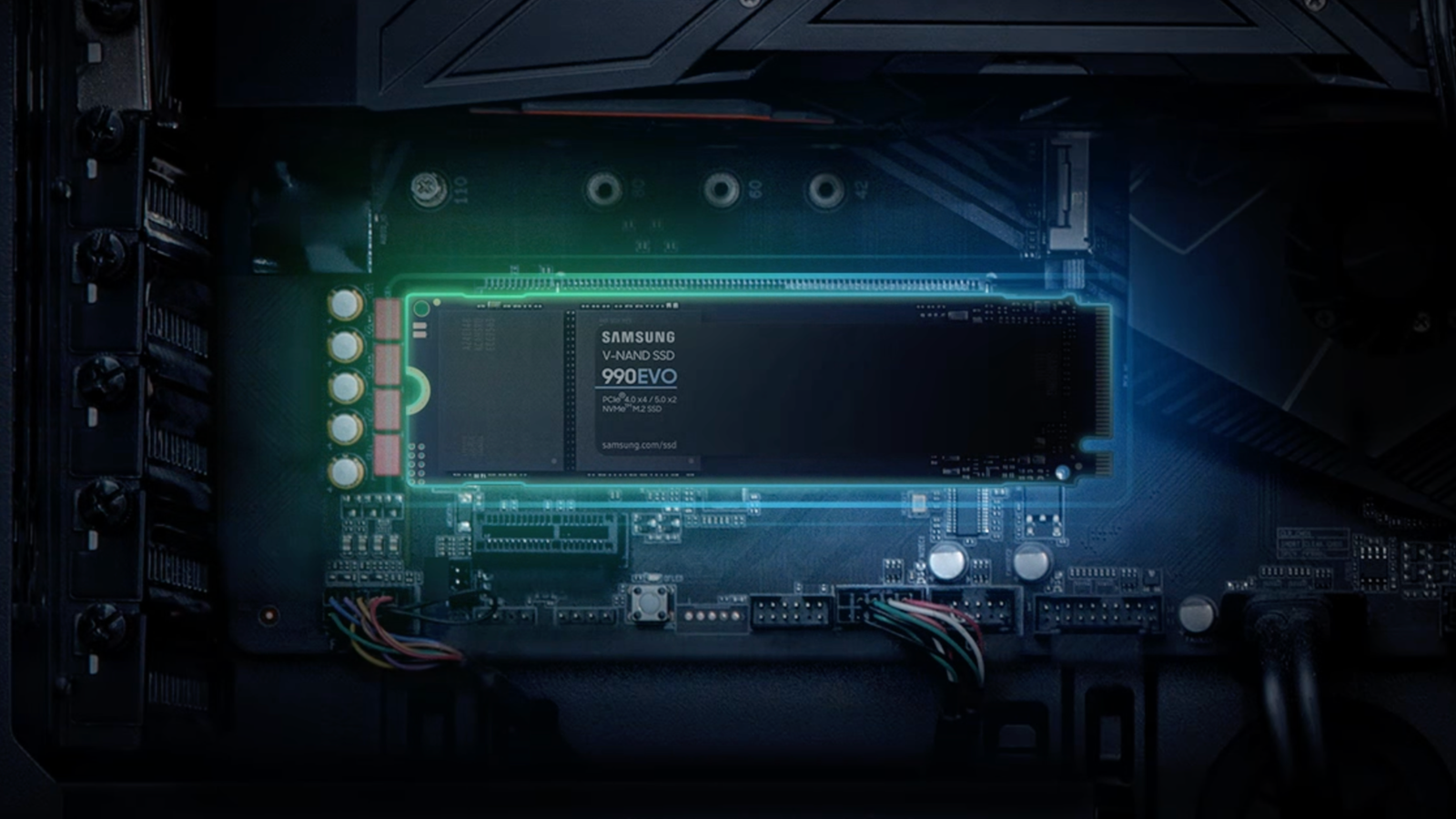 SAMSUNG 990 EVO SSD glowing on a motherboard