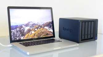 Photo of a MacBook Pro connected to a Synology NAS.