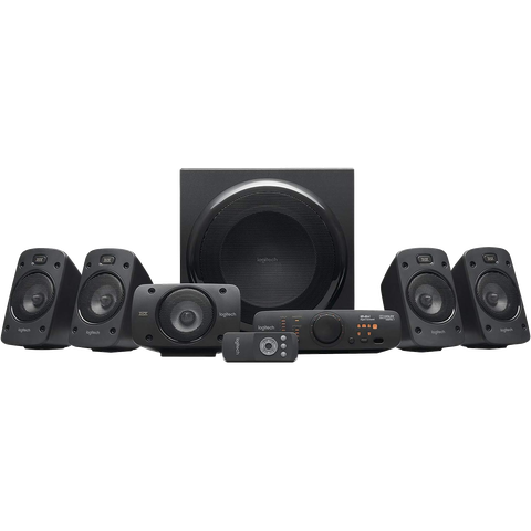 A Logitech Z906 5.1 Surround Sound Speaker System in black showing the subwoofer, speakers, remote, and receiver.