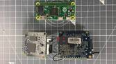 A NanoPi NEO, Orange Pi Zero, and a Raspberry Pi Zero placed next to each other