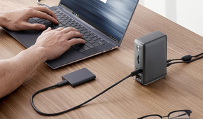Anker 575 docking station on table plugged into portable SSD