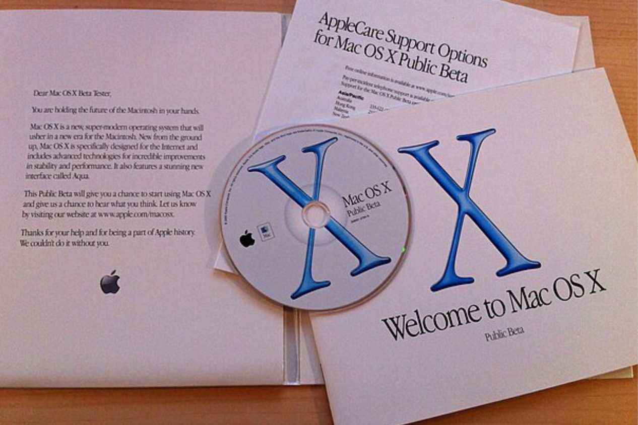 The install disk and manuals for Mac OS X.