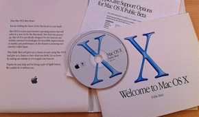The install disk and manuals for Mac OS X.