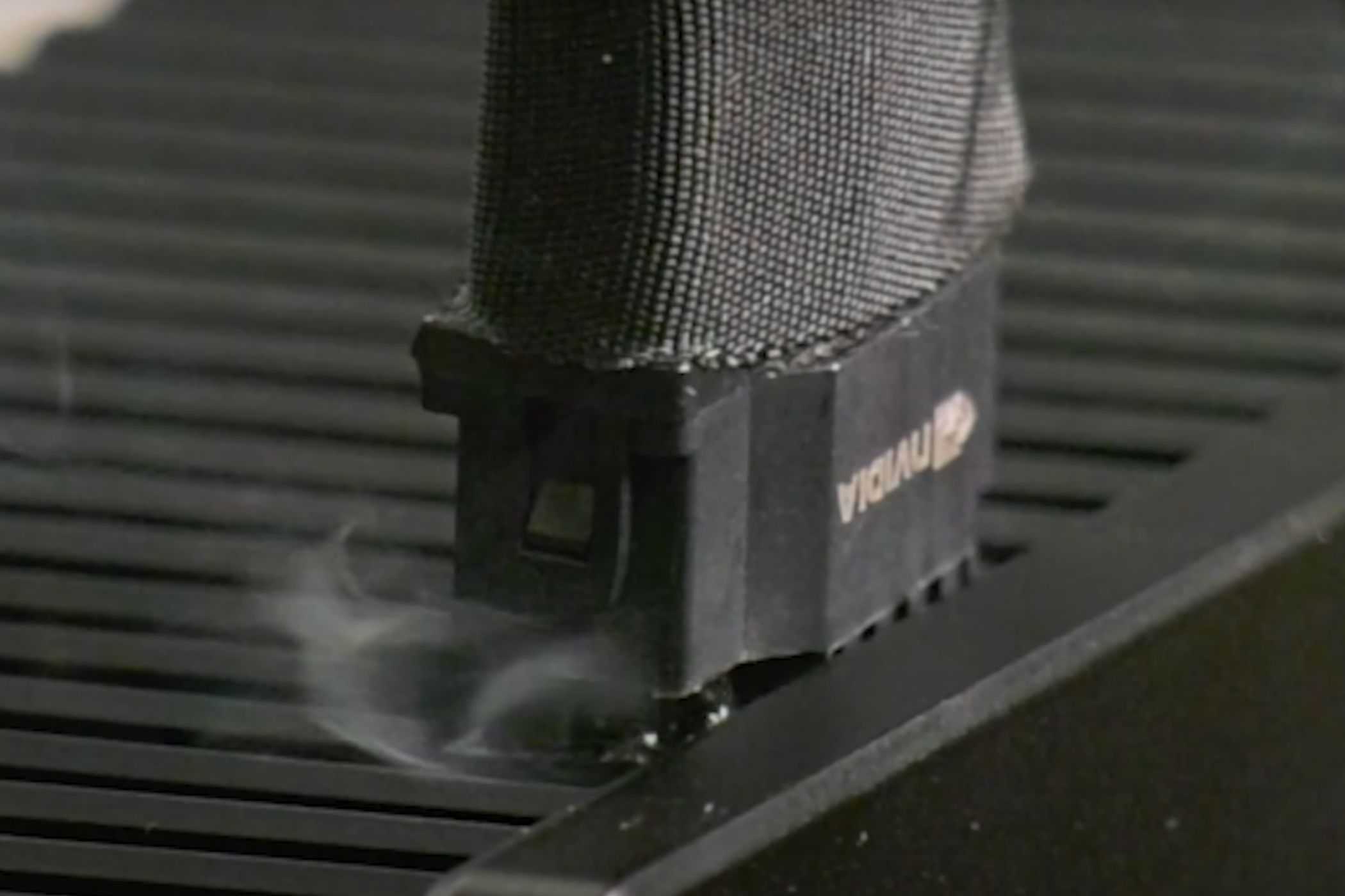 A screenshot showing fumes coming out of an RTX 4090's 12VHPWR connector.