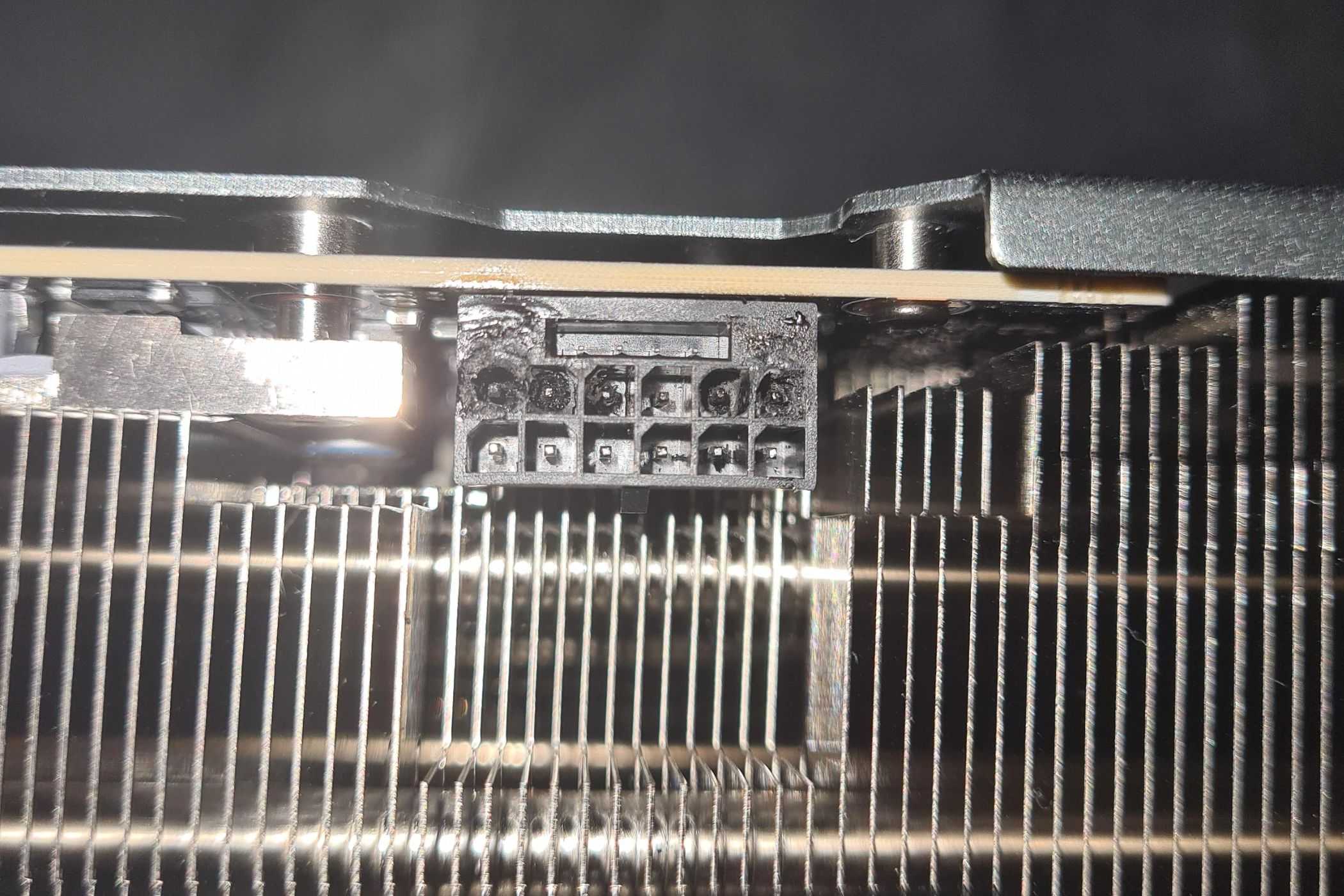 An image showing a burnt 12VHPWR connector on an RTX 4090 GPU.