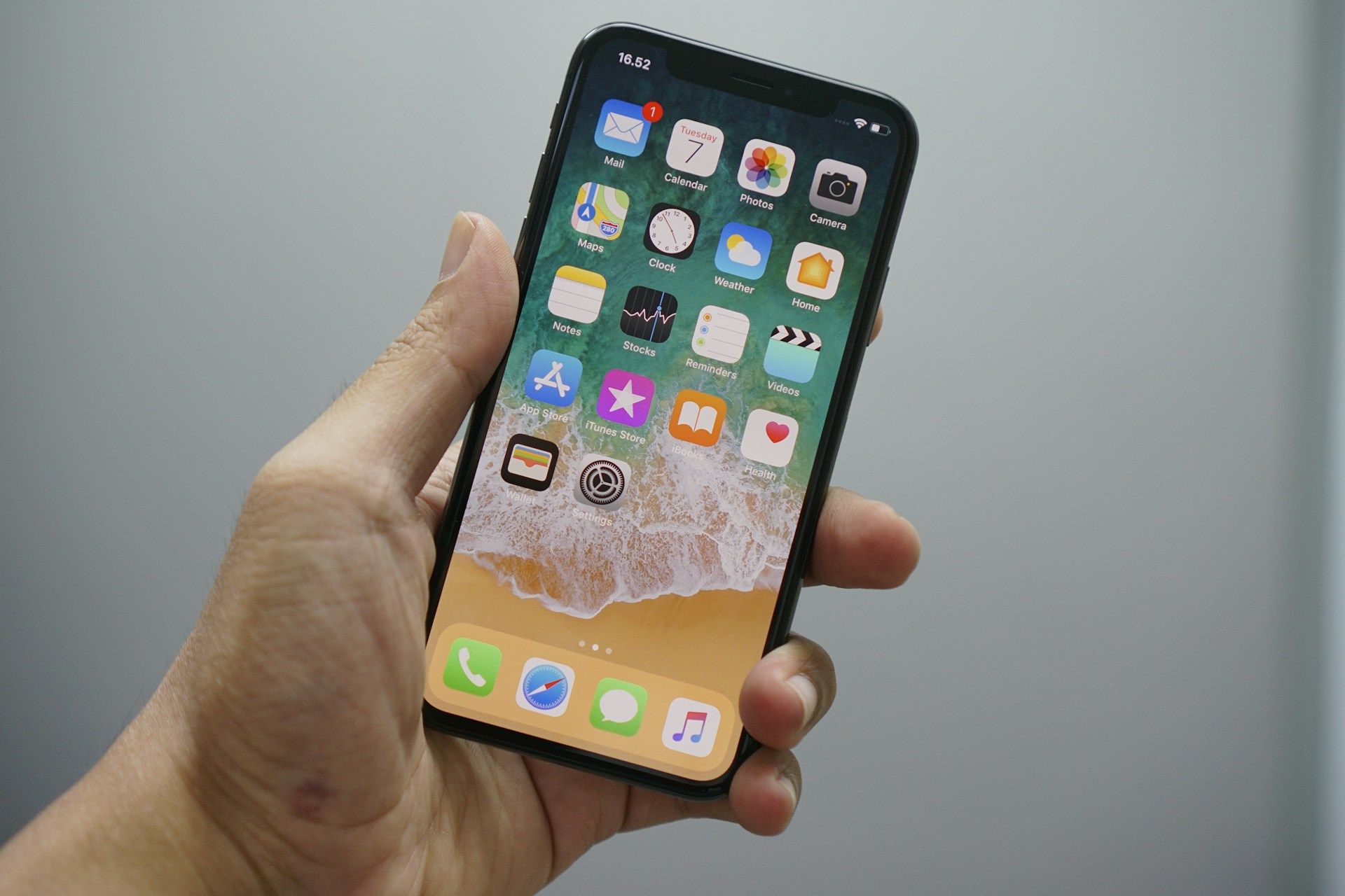 person holding iphone up to camera