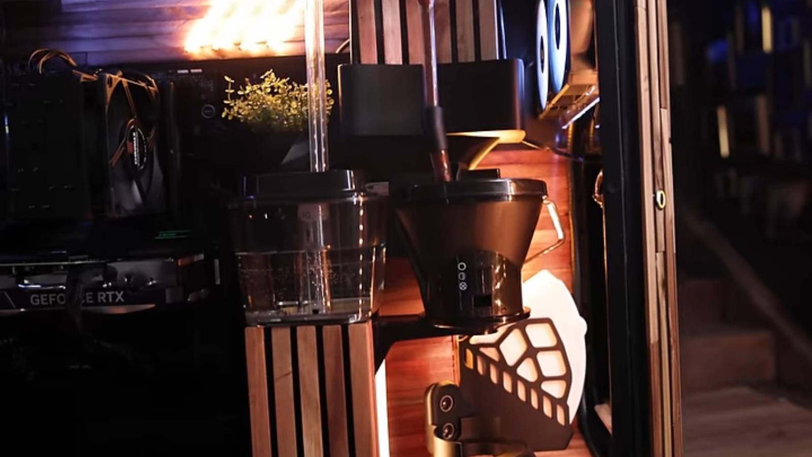 Someone crammed a coffee machine into their PC case, and it works ...