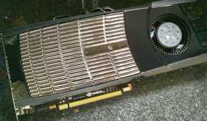 An image showing an Nvidia GTX 480 GPU kept on a deskmat.