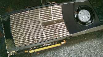 An image showing an Nvidia GTX 480 GPU kept on a deskmat.