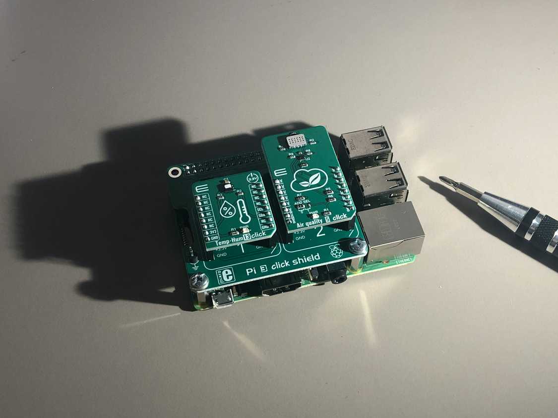 A Raspberry Pi with addon boards attached.