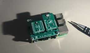 A Raspberry Pi with addon boards attached.
