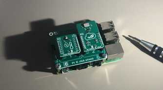 A Raspberry Pi with addon boards attached.