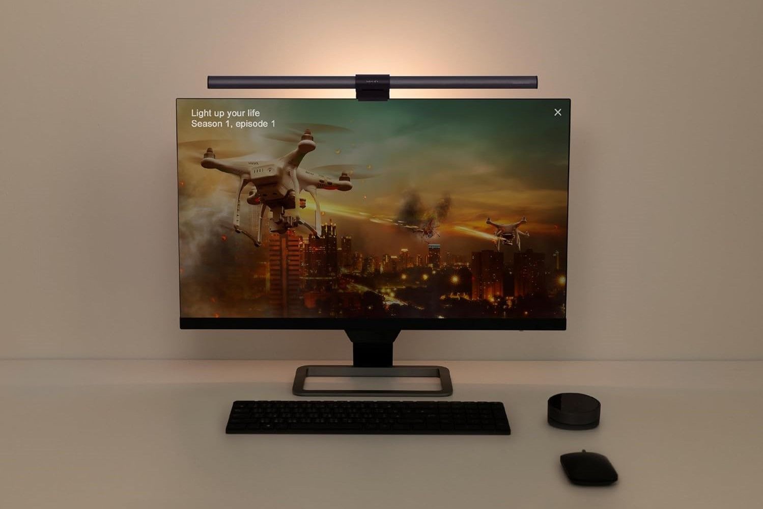 Monitor with a light bar installed at the top