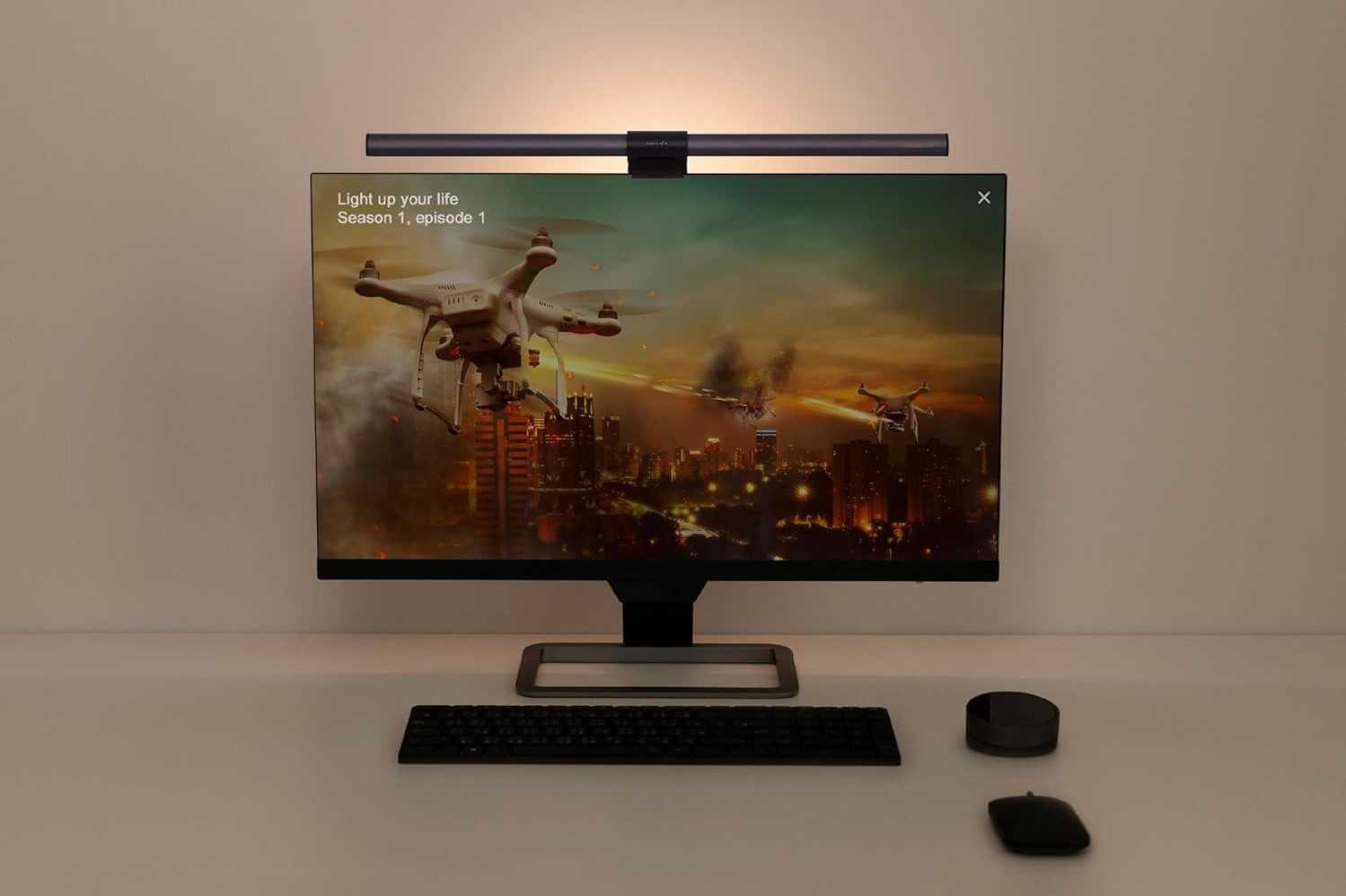 Monitor with a light bar installed at the top