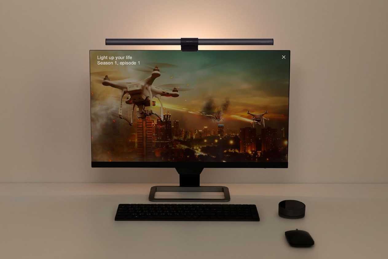 Monitor with a light bar installed at the top
